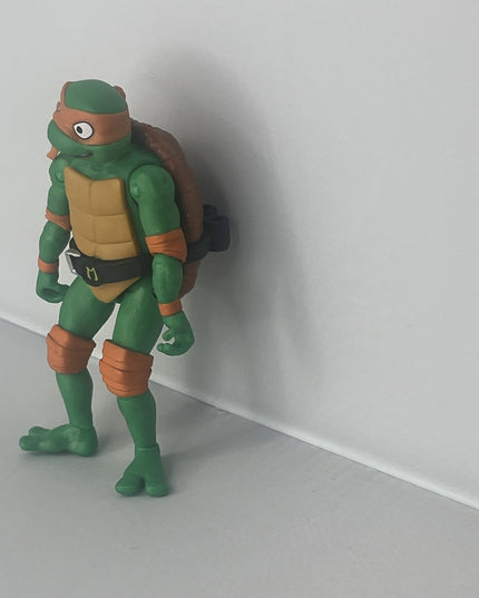 Teenage Mutant Ninja Turtles: Mutant Mayhem 4.25” Michelangelo Action Figure