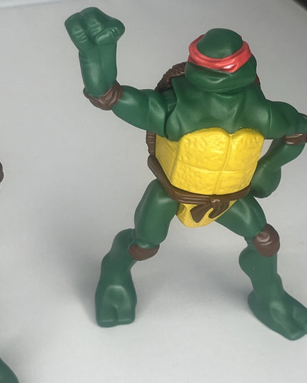Lot of Three Ninja Turtle Action Figures