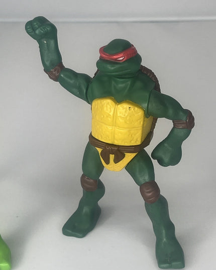 Lot of Three Ninja Turtle Action Figures