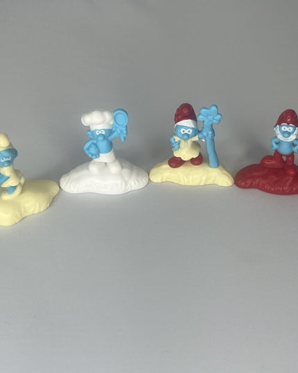 Lot of Four Peyo Plastic Smurf McDonalds Toys