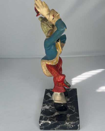 DEPOSE hat-tipping clown statue on marble base, #945
