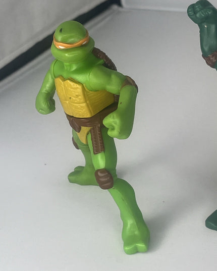 Lot of Three Ninja Turtle Action Figures