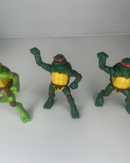 Lot of Three Ninja Turtle Action Figures